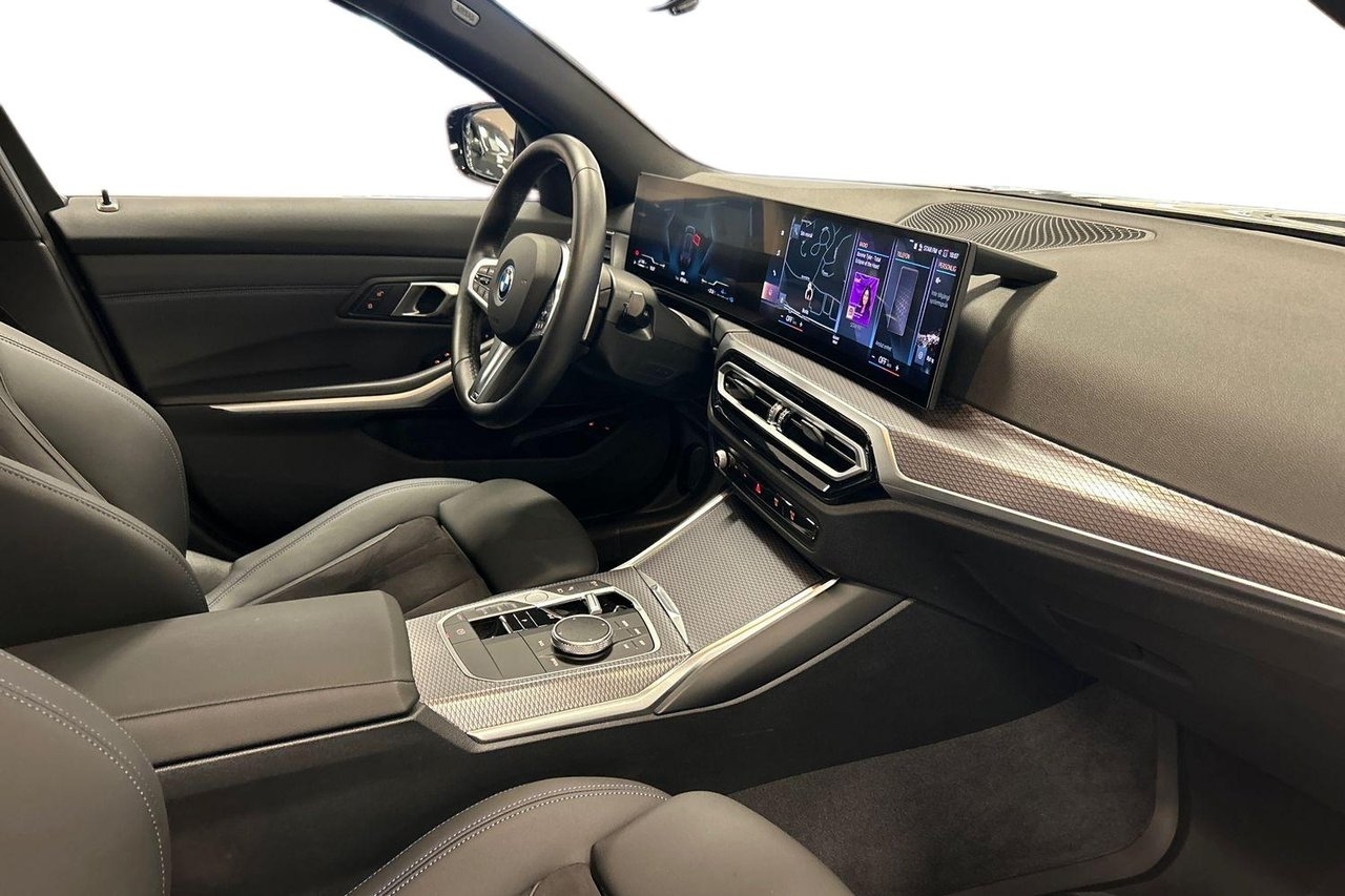 BMW 330 e xDrive Touring M-Sport 2024, photo 6/10
