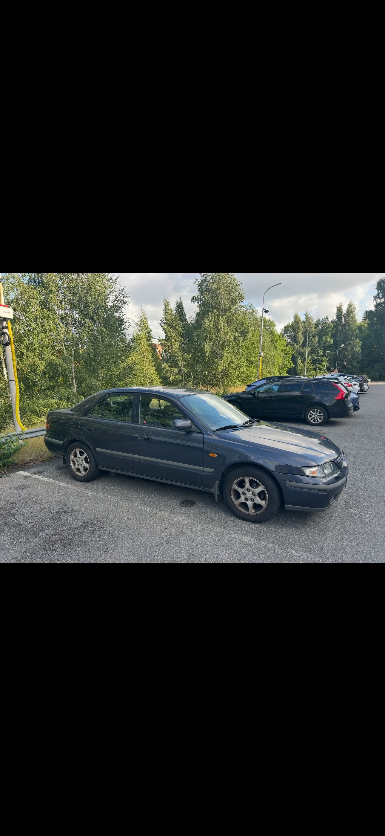 Mazda 626 Sedan 2.0 Manuell 1998, bild 2/4