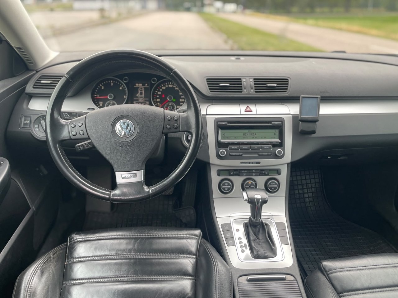 Volkswagen Passat 2009, bild 6/10