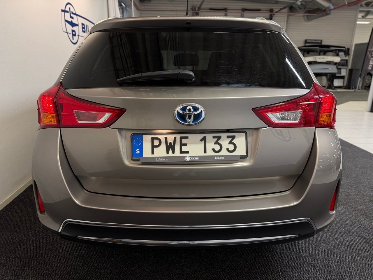 Toyota Auris Touring Sports Hybrid 2014, bild 4/10