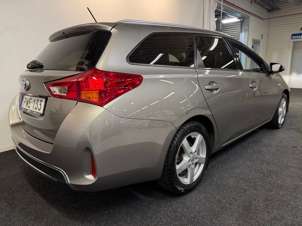 Toyota Auris Touring Sports Hybrid 2014, bild 3/10