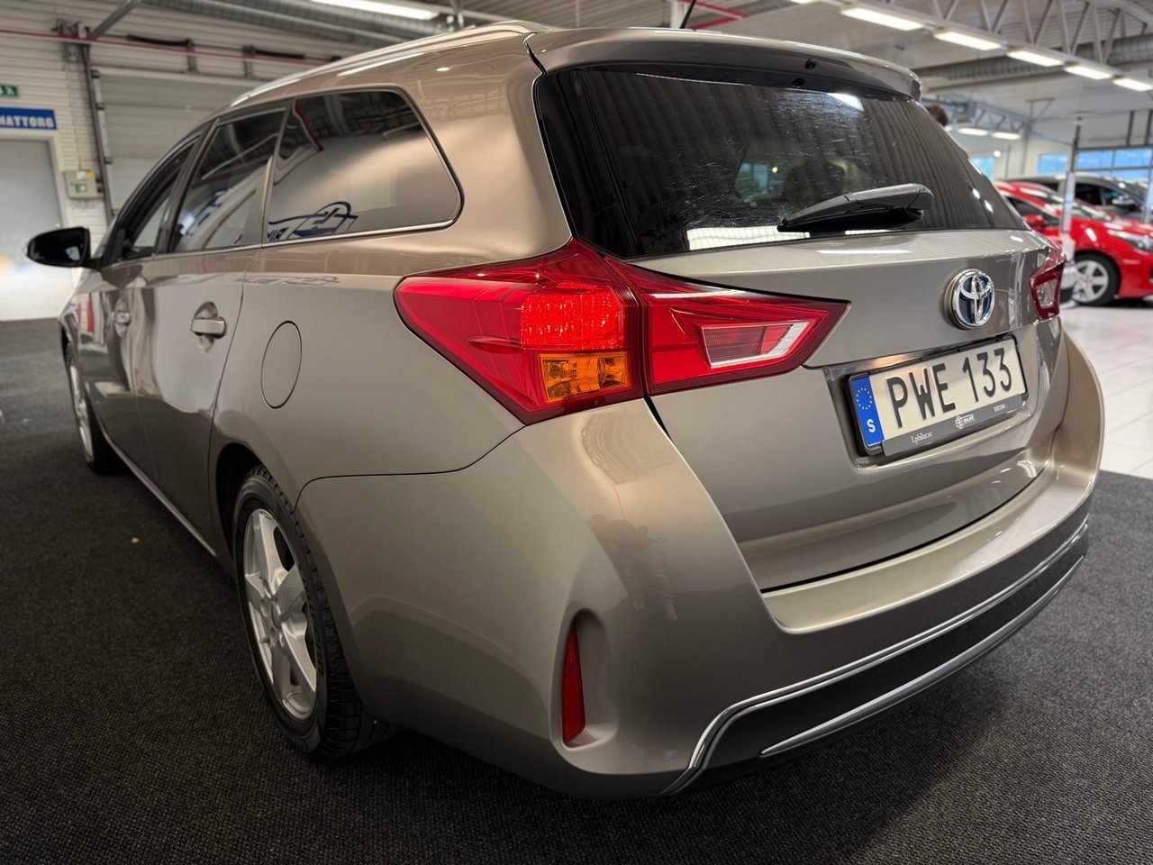Toyota Auris Touring Sports Hybrid 2014, bild 5/10