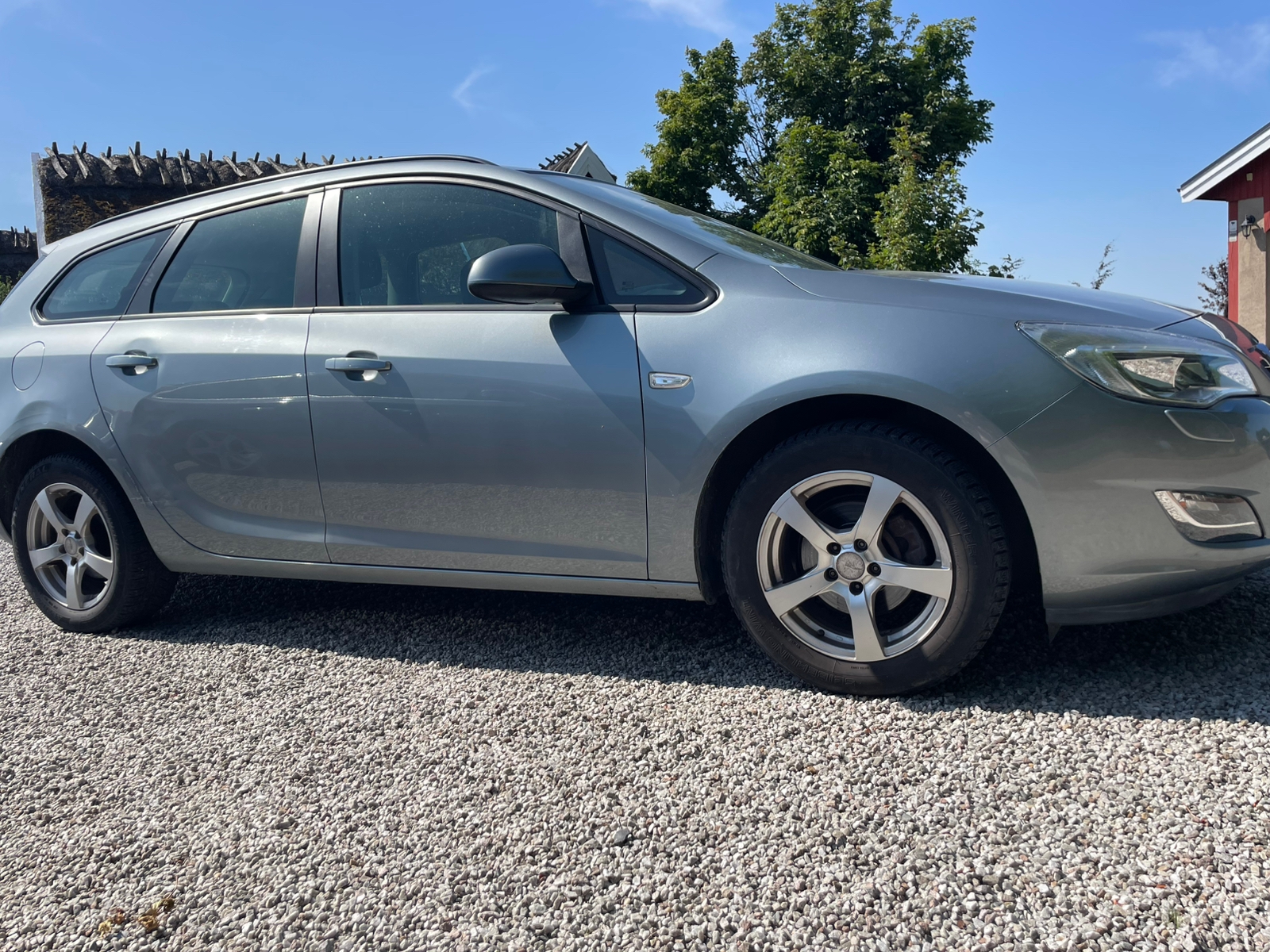 Opel Astra 2012, kuva 3/4