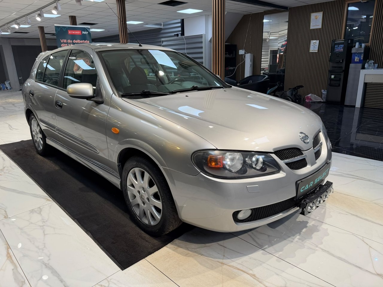 Nissan Almera 2004, bild 7/10