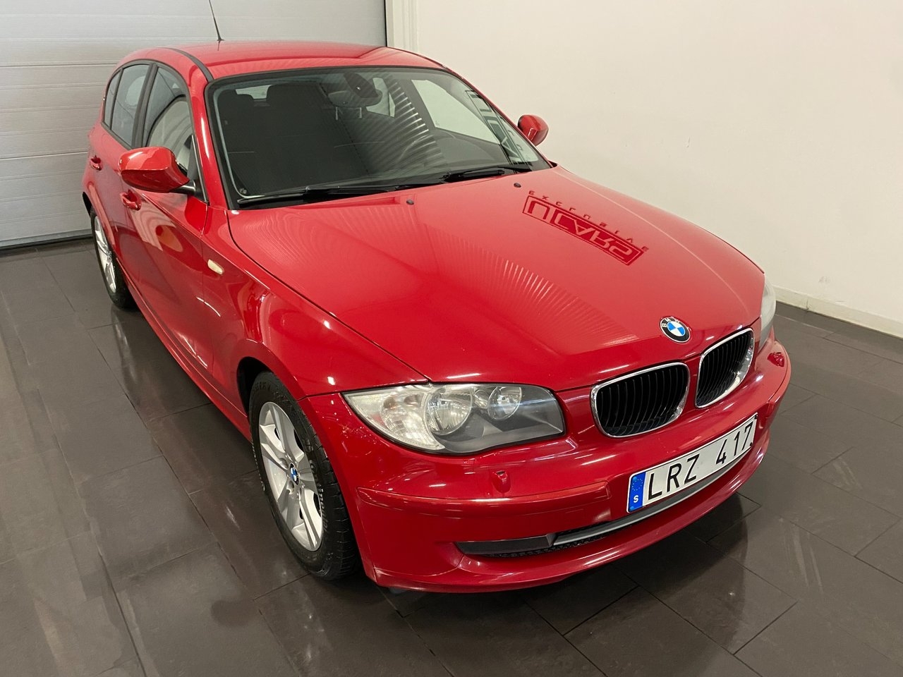 BMW 118 d Steptronic Comfort 2011, bild 7/21