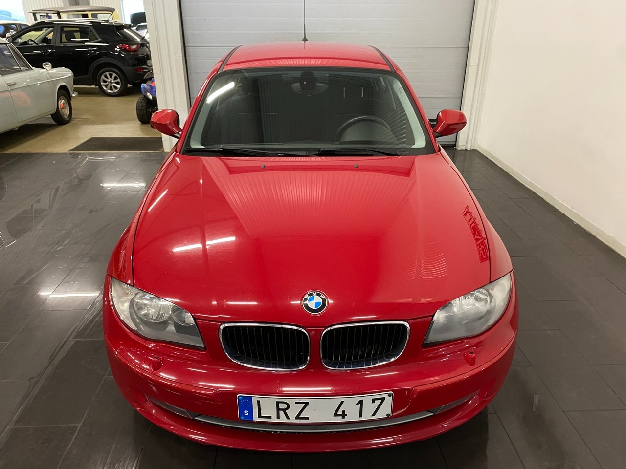 BMW 118 d Steptronic Comfort 2011, bild 6/21