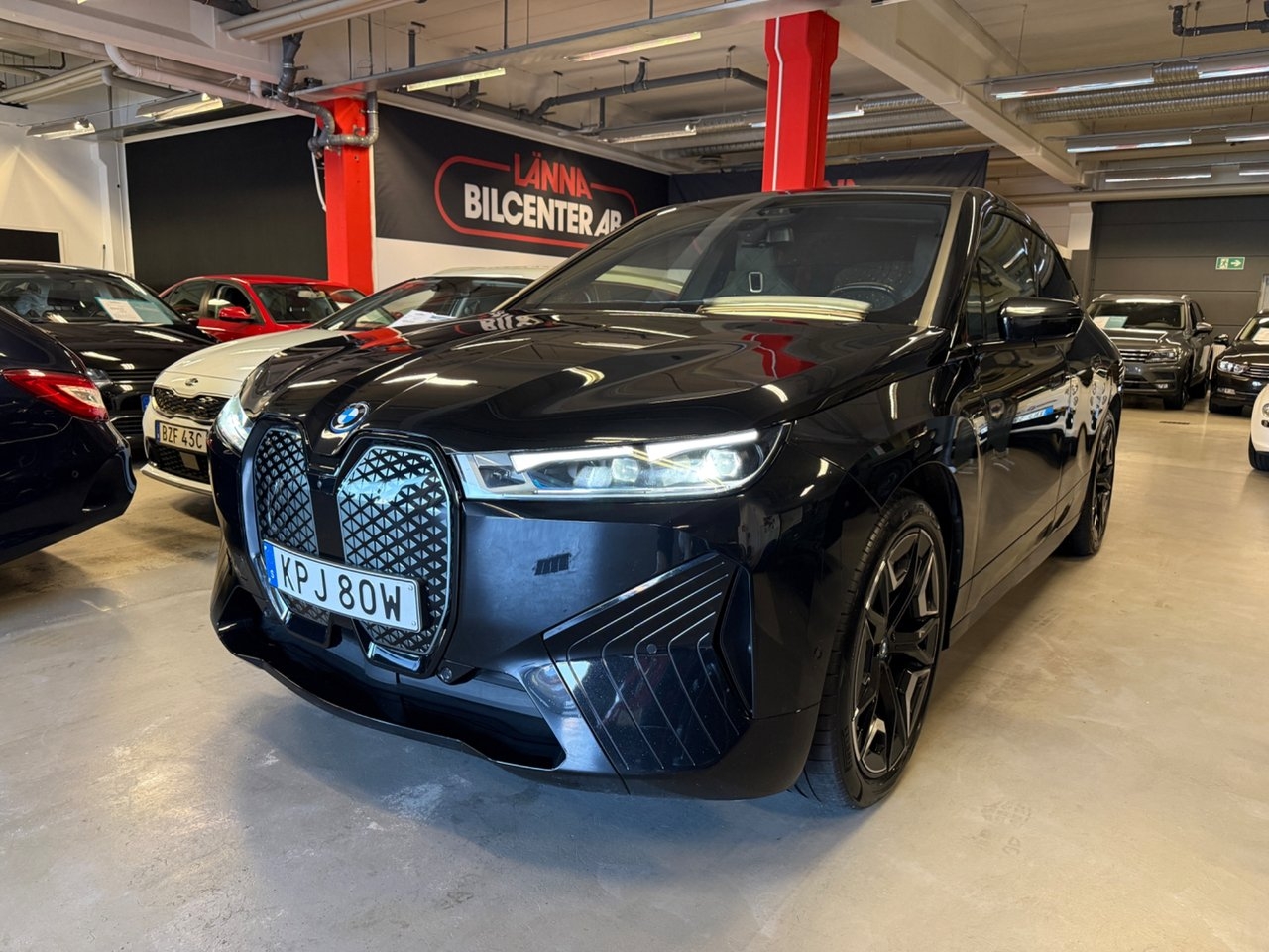BMW iX 2024, photo 3/10