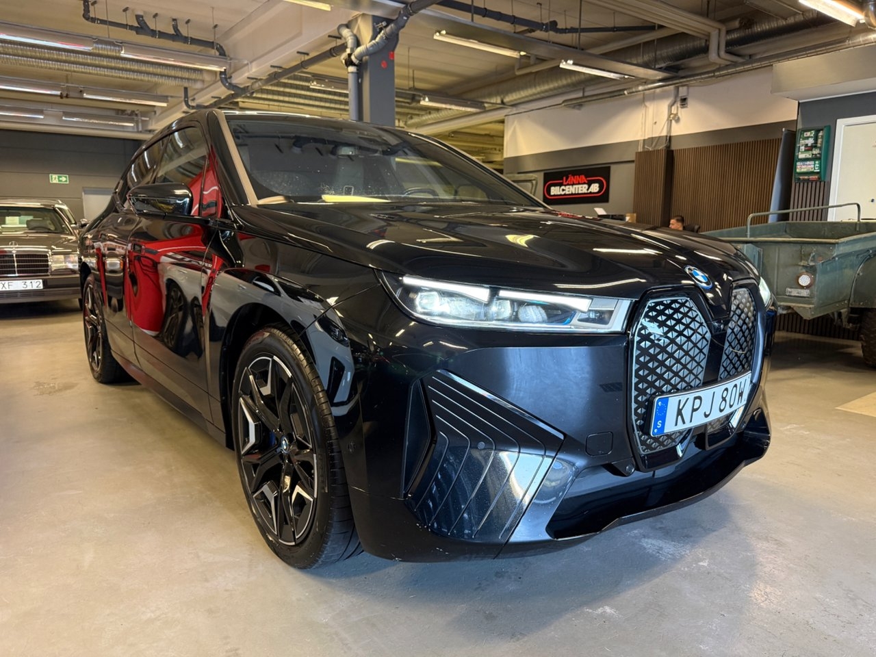 BMW iX 2024, photo 5/10