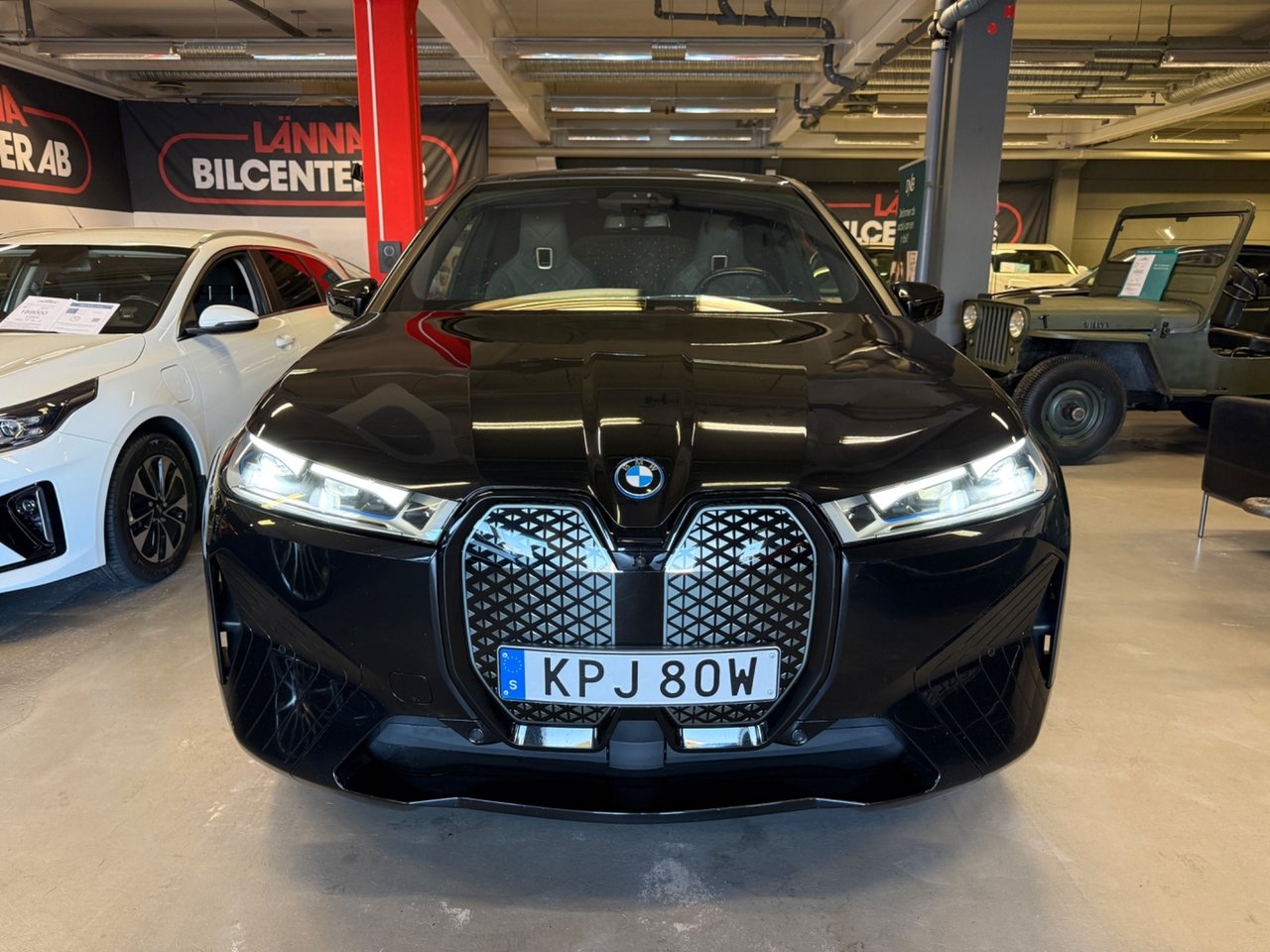 BMW iX 2024, photo 4/10