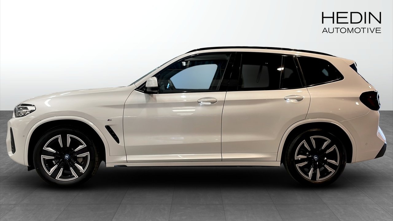 BMW iX3 2023, photo 6/10