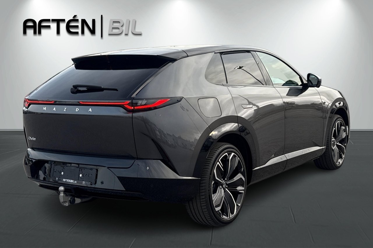 Mazda CX-6e 78 kWh Takumi 2026, photo 7/10