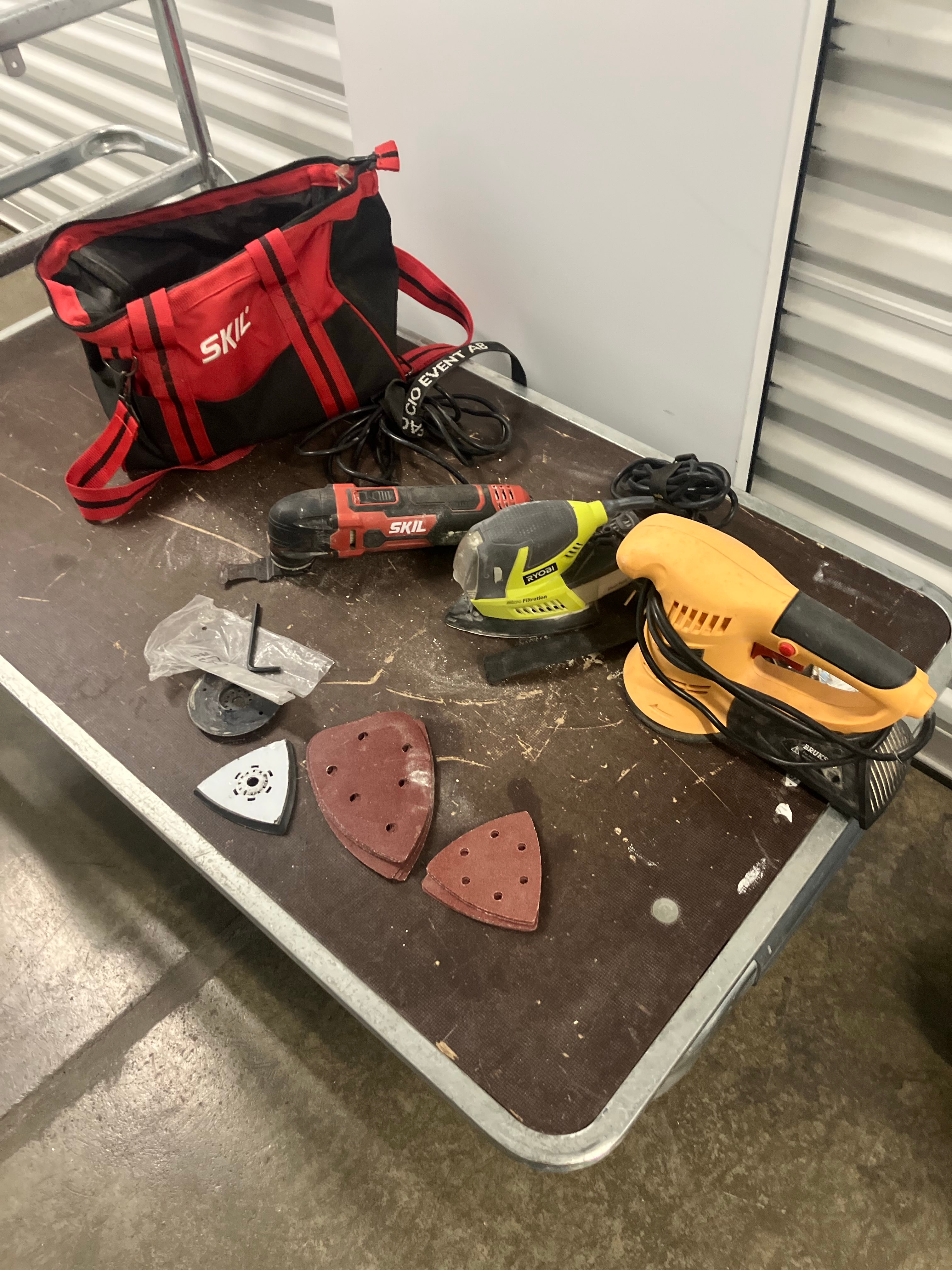 Bruksb orbital sander, Ryobi palm sander, Skil Fein saw bag and attachment.