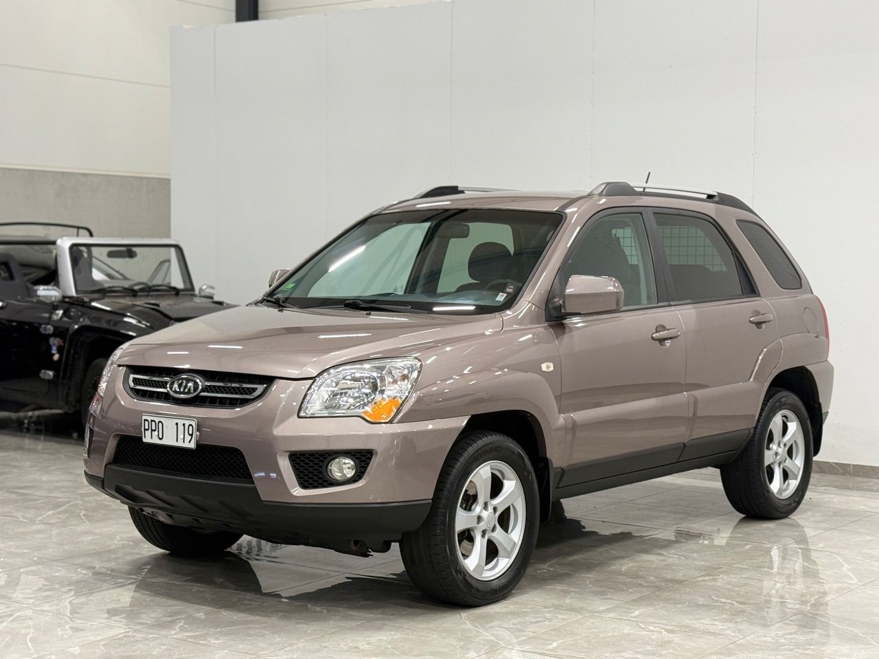 Kia Sportage 2.0 CVVT 4WD 2010, kuva 4/10