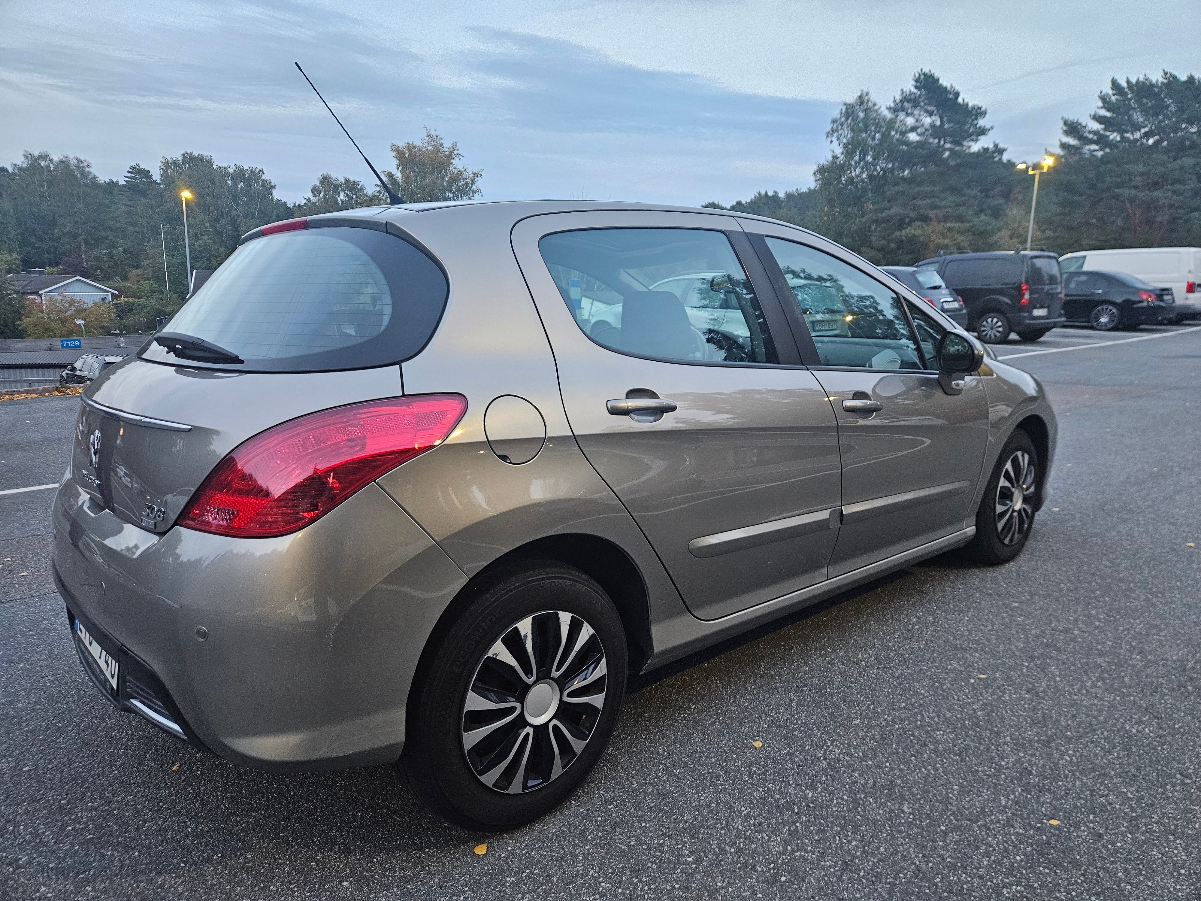 Peugeot 308 2011, bild 5/10
